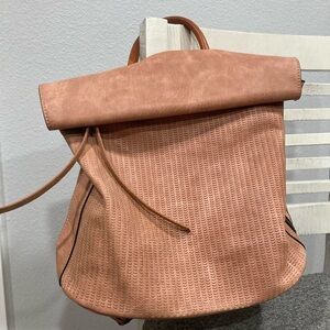 ChillX By Le Miel blushing pink perforated roll up flap backpack carry purse